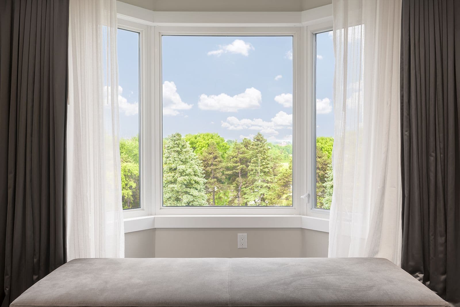 A bay window with large central picture window.