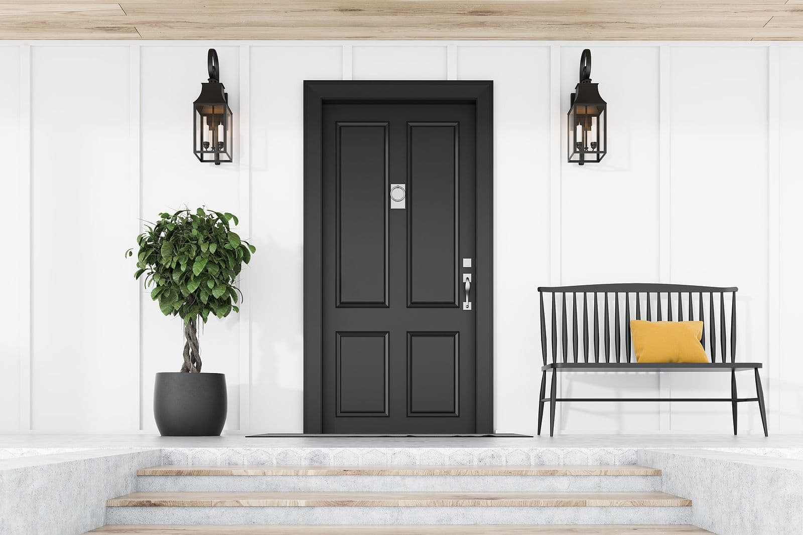 A new black entry door on a white house with a tree and a bench.